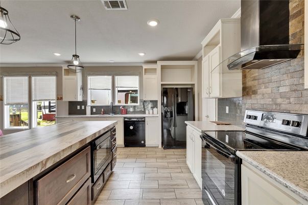 Interior, Kitchen, Pendant Lights, Recessed Lighting, Stainless Steel Appliances, Stone Walls