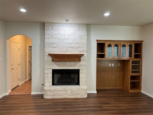 Fireplace, Interior, Recessed Lighting, Stone Walls, Wood Texture Flooring