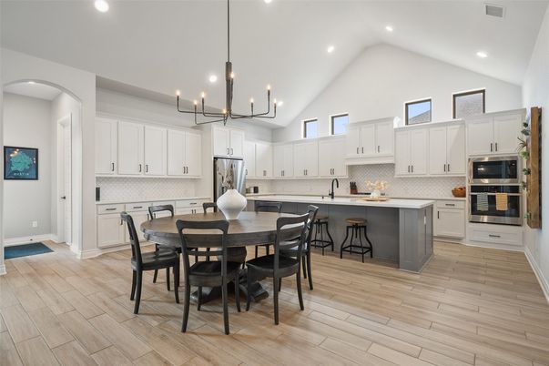 Dining room, Interior, Kitchen, Pendant Lights, Recessed Lighting, Stainless Steel Appliances, Wood Texture Flooring