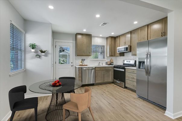 Dining room, Interior, Kitchen, Recessed Lighting, Stainless Steel Appliances, Wood Texture Flooring