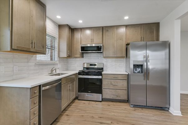 Interior, Kitchen, Recessed Lighting, Stainless Steel Appliances, Wood Texture Flooring