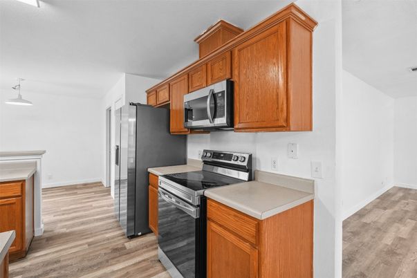 Interior, Kitchen, Pendant Lights, Stainless Steel Appliances, Wood Texture Flooring