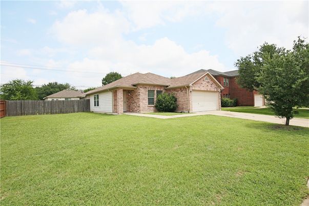Attached, Backyard, Exterior, Facade, Brick Facade, Ranch