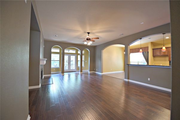 Empty room, Fireplace, Interior, Pendant Lights, Recessed Lighting, Wood Texture Flooring