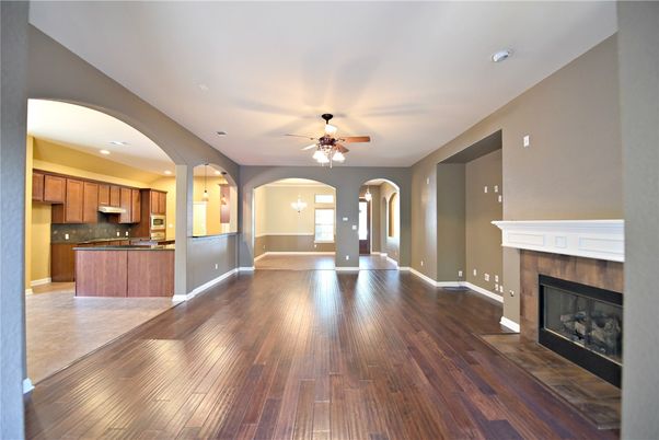 Empty room, Fireplace, Interior, Kitchen, Recessed Lighting, Wood Texture Flooring