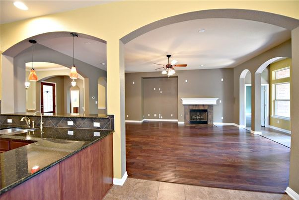 Fireplace, Interior, Pendant Lights, Recessed Lighting, Wood Texture Flooring