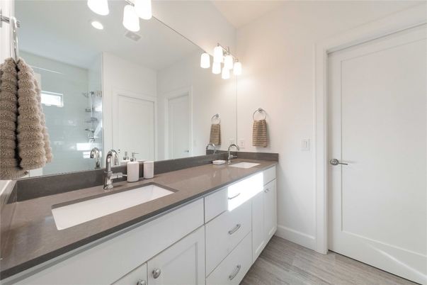 Bathroom, Dual Sink Vanities, Interior, Recessed Lighting, Wood Texture Flooring