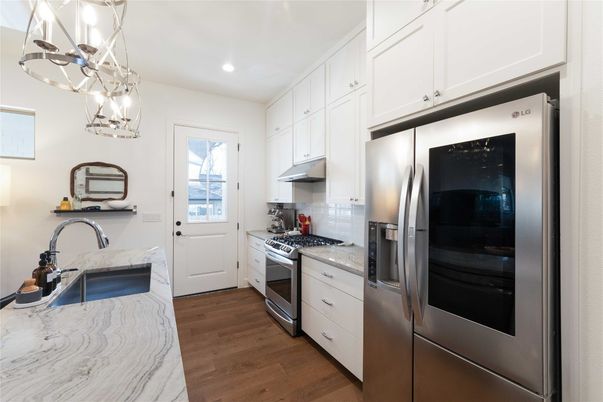 Interior, Kitchen, Pendant Lights, Recessed Lighting, Stainless Steel Appliances, Wood Texture Flooring
