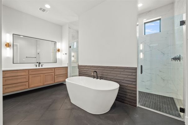 Bathroom, Dual Sink Vanities, Free Standing Baths, Glass Shower, Interior, Marble Walls, Recessed Lighting