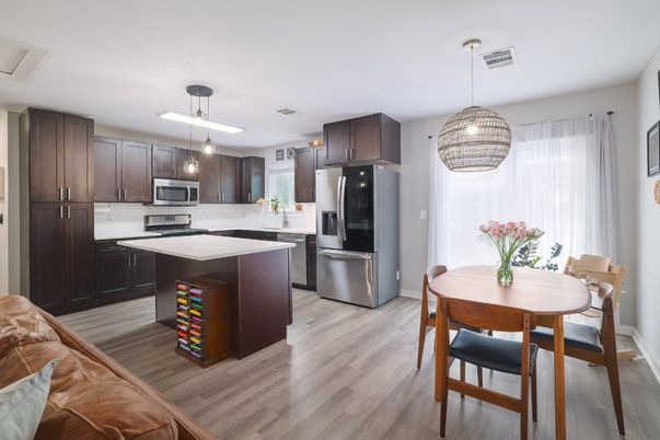 Dining room, Interior, Kitchen, Pendant Lights, Stainless Steel Appliances, Wood Texture Flooring