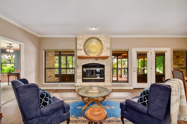 Fireplace, Interior, Living room, Recessed Lighting, Stone Walls, Wood Texture Flooring