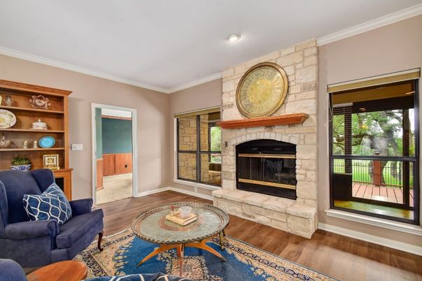 Fireplace, Interior, Living room, Recessed Lighting, Stone Walls, Wood Texture Flooring