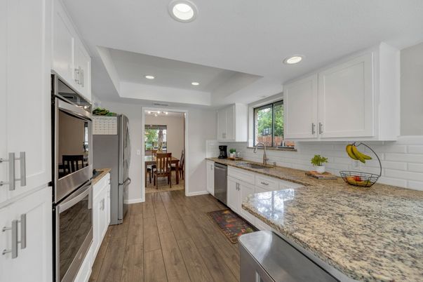 Dining room, Interior, Kitchen, Recessed Lighting, Stainless Steel Appliances, Wood Texture Flooring