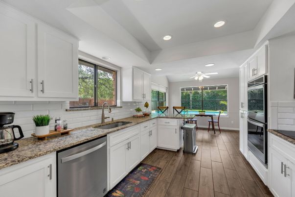 Dining room, Interior, Kitchen, Recessed Lighting, Stainless Steel Appliances, Wood Texture Flooring