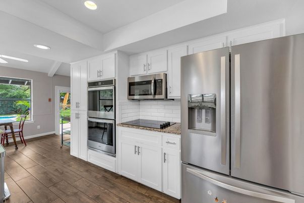 Interior, Kitchen, Recessed Lighting, Stainless Steel Appliances, Wood Texture Flooring