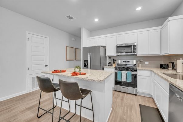 Interior, Kitchen, Recessed Lighting, Stainless Steel Appliances, Wood Texture Flooring