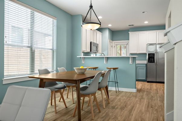 Dining room, Interior, Kitchen, Pendant Lights, Recessed Lighting, Stainless Steel Appliances, Wood Texture Flooring