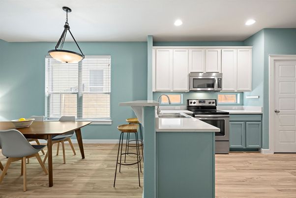 Dining room, Interior, Kitchen, Pendant Lights, Recessed Lighting, Stainless Steel Appliances, Wood Texture Flooring