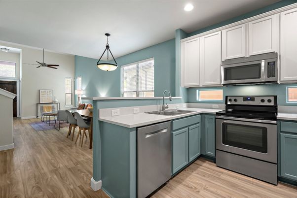 Dining room, Interior, Kitchen, Pendant Lights, Recessed Lighting, Stainless Steel Appliances, Wood Texture Flooring