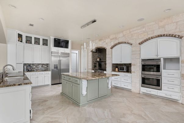 Interior, Kitchen, Pendant Lights, Recessed Lighting, Stainless Steel Appliances, Stone Walls