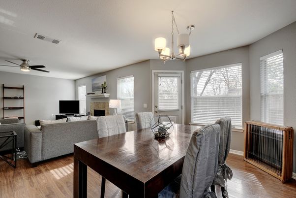 Chandelier, Dining room, Fireplace, Interior, Living room, Wood Texture Flooring