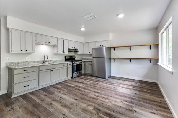 Interior, Kitchen, Recessed Lighting, Stainless Steel Appliances, Wood Texture Flooring