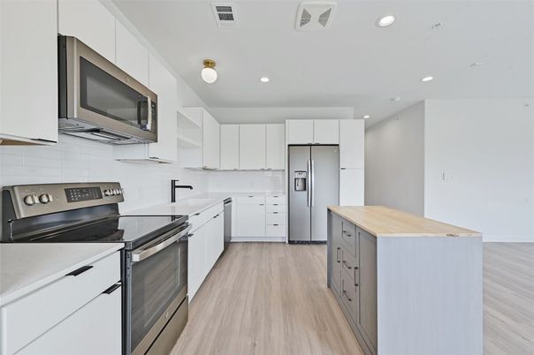 Interior, Kitchen, Recessed Lighting, Stainless Steel Appliances, Wood Texture Flooring