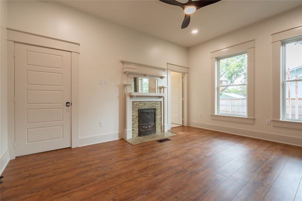 Empty room, Fireplace, Interior, Recessed Lighting, Wood Texture Flooring