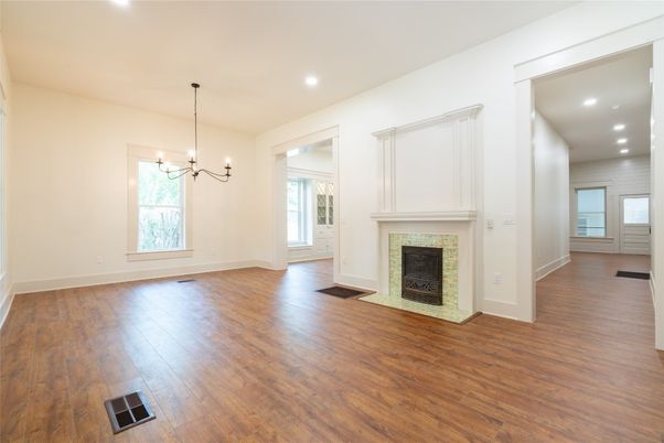 Chandelier, Empty room, Fireplace, Interior, Recessed Lighting, Wood Texture Flooring