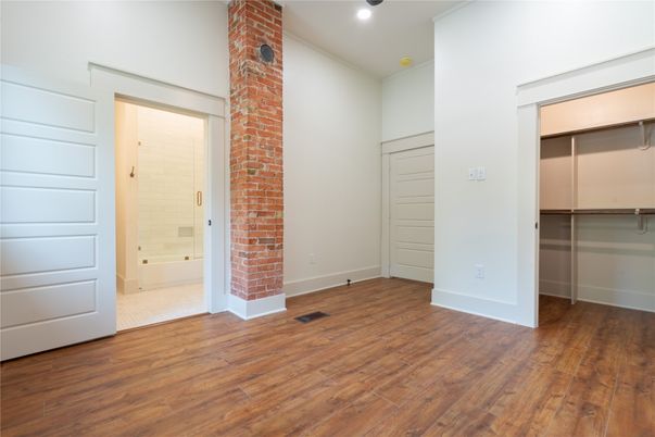 Empty room, Interior, Recessed Lighting, Stone Walls, Wood Texture Flooring