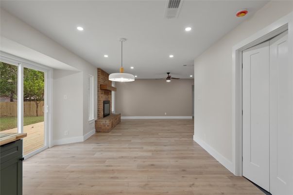 Empty room, Fireplace, Interior, Pendant Lights, Recessed Lighting, Wood Texture Flooring