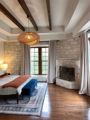 Bedroom, Fireplace, Interior, Pendant Lights, Stone Walls, Wooden Beams, Wood Texture Flooring