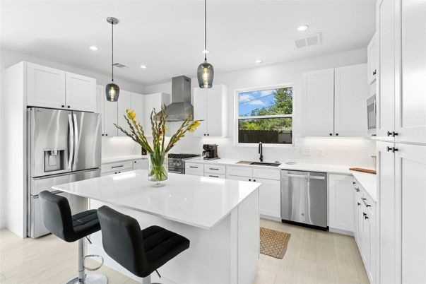 Interior, Kitchen, Pendant Lights, Recessed Lighting, Stainless Steel Appliances, Wood Texture Flooring