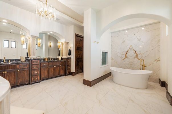 Bathroom, Chandelier, Dual Sink Vanities, Free Standing Baths, Interior, Marble, Marble Walls, Recessed Lighting