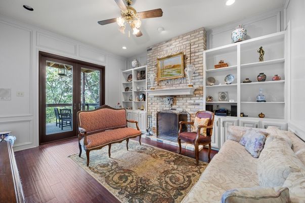 Fireplace, Interior, Living room, Recessed Lighting, Stone Walls, Wood Texture Flooring