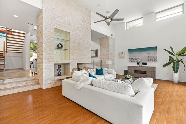 Fireplace, Interior, Living room, Recessed Lighting, Stone Walls, Wood Texture Flooring