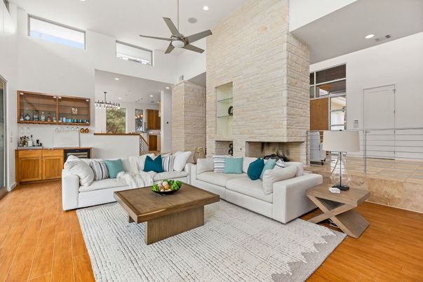 Fireplace, Interior, Living room, Recessed Lighting, Stone Walls, Wood Texture Flooring