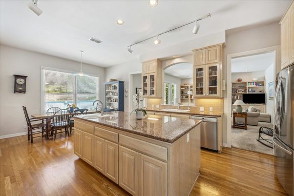 Dining room, Interior, Kitchen, Pendant Lights, Recessed Lighting, Stainless Steel Appliances, Wood Texture Flooring