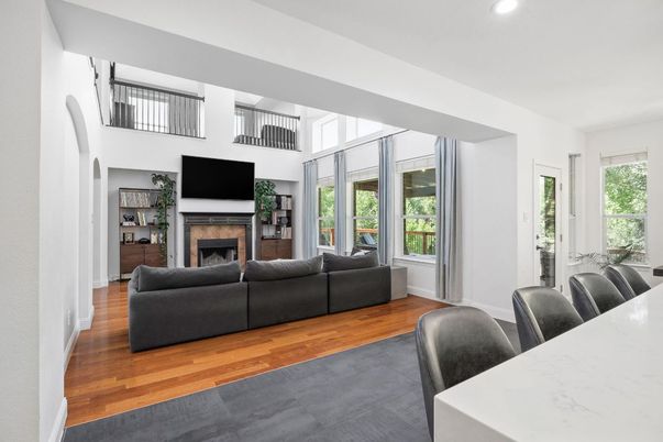 Dining room, Fireplace, Interior, Living room, Recessed Lighting, Wood Texture Flooring