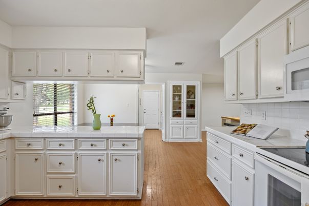 Interior, Kitchen, Tile Countertops, Wood Texture Flooring