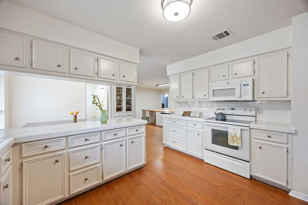 Interior, Kitchen, Tile Countertops, Wood Texture Flooring