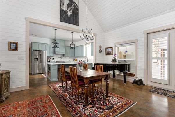Chandelier, Dining room, Interior, Kitchen, Pendant Lights, Piano, Stainless Steel Appliances, Wood Texture Flooring