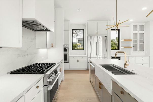 Interior, Kitchen, Marble Walls, Pendant Lights, Recessed Lighting, Stainless Steel Appliances, Wood Texture Flooring