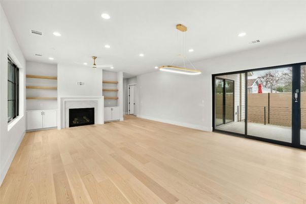 Empty room, Fireplace, Interior, Pendant Lights, Recessed Lighting, Wood Texture Flooring