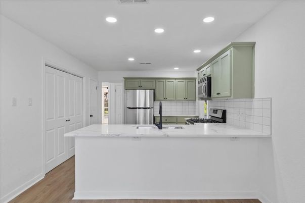 Interior, Kitchen, Recessed Lighting, Stainless Steel Appliances, Wood Texture Flooring