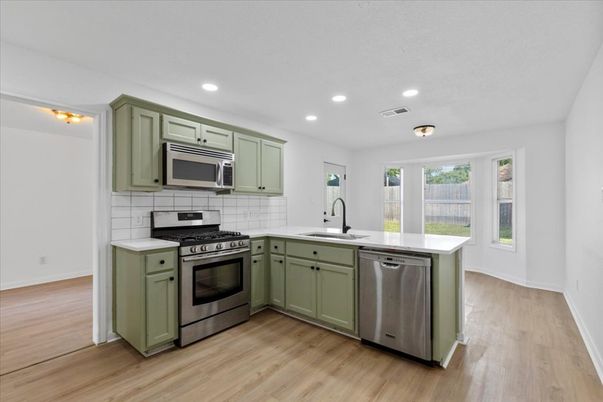 Interior, Kitchen, Recessed Lighting, Stainless Steel Appliances, Wood Texture Flooring
