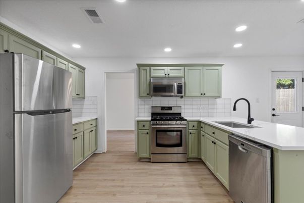 Interior, Kitchen, Recessed Lighting, Stainless Steel Appliances, Wood Texture Flooring