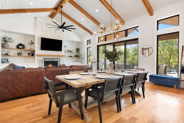 Dining room, Fireplace, Interior, Living room, Pendant Lights, Recessed Lighting, Stone Walls, Wooden Beams, Wood Texture Flooring