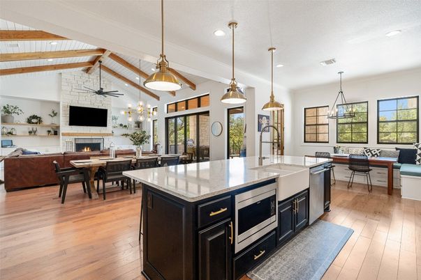 Dining room, Fireplace, Interior, Kitchen, Living room, Pendant Lights, Recessed Lighting, Wooden Beams, Wooden Ceilings, Wood Texture Flooring