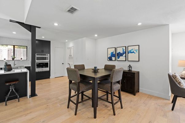 Dining room, Interior, Kitchen, Recessed Lighting, Stainless Steel Appliances, Wood Texture Flooring